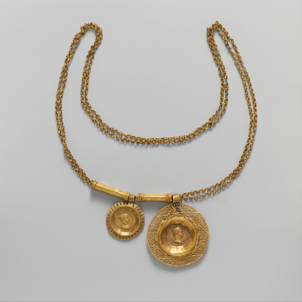 Gold Necklace With Coin pendants
The Origins and History of Luxury